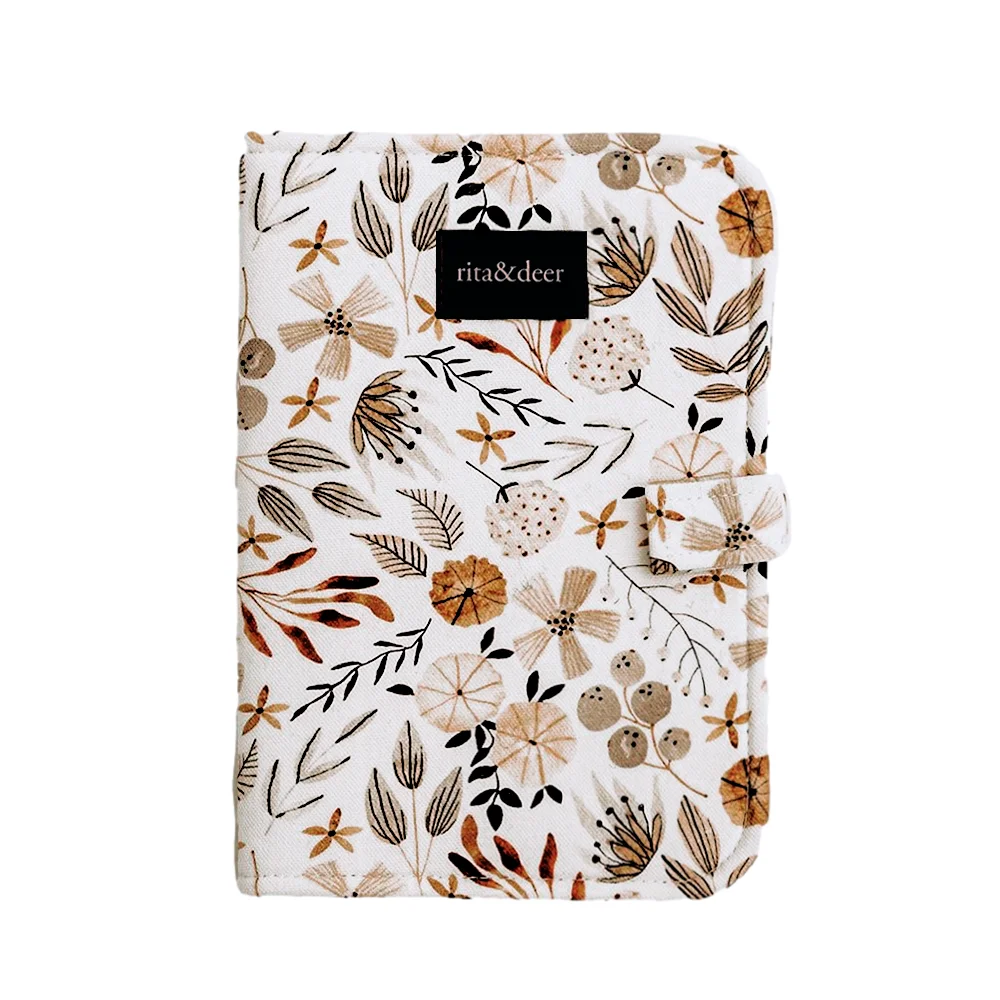 portadocumentos de bebé bloom con estampado de flores antimanchas e impermeable