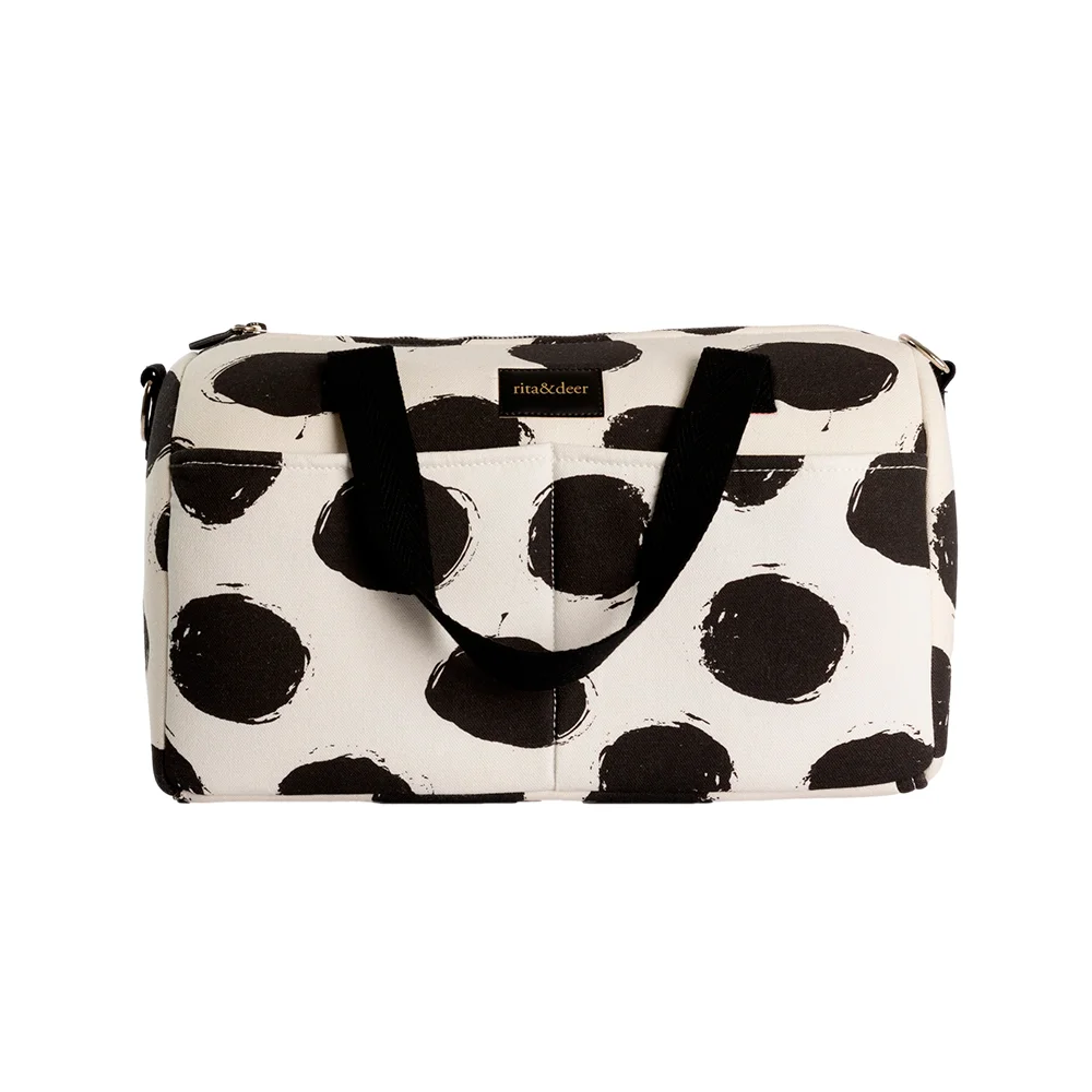 bolso para carro chester en color blanco cococnut milk y motas en negro