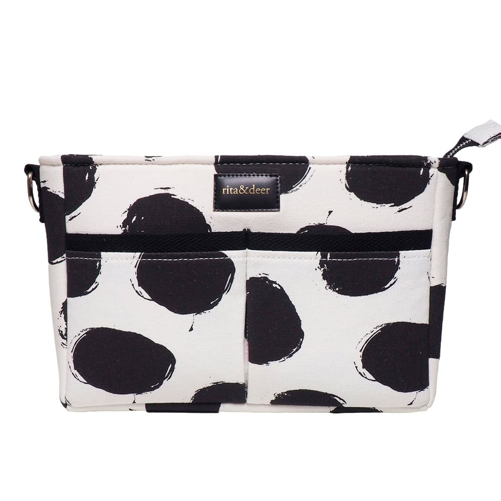bolso organizador de bebe con estampado de motas o lunares en negro