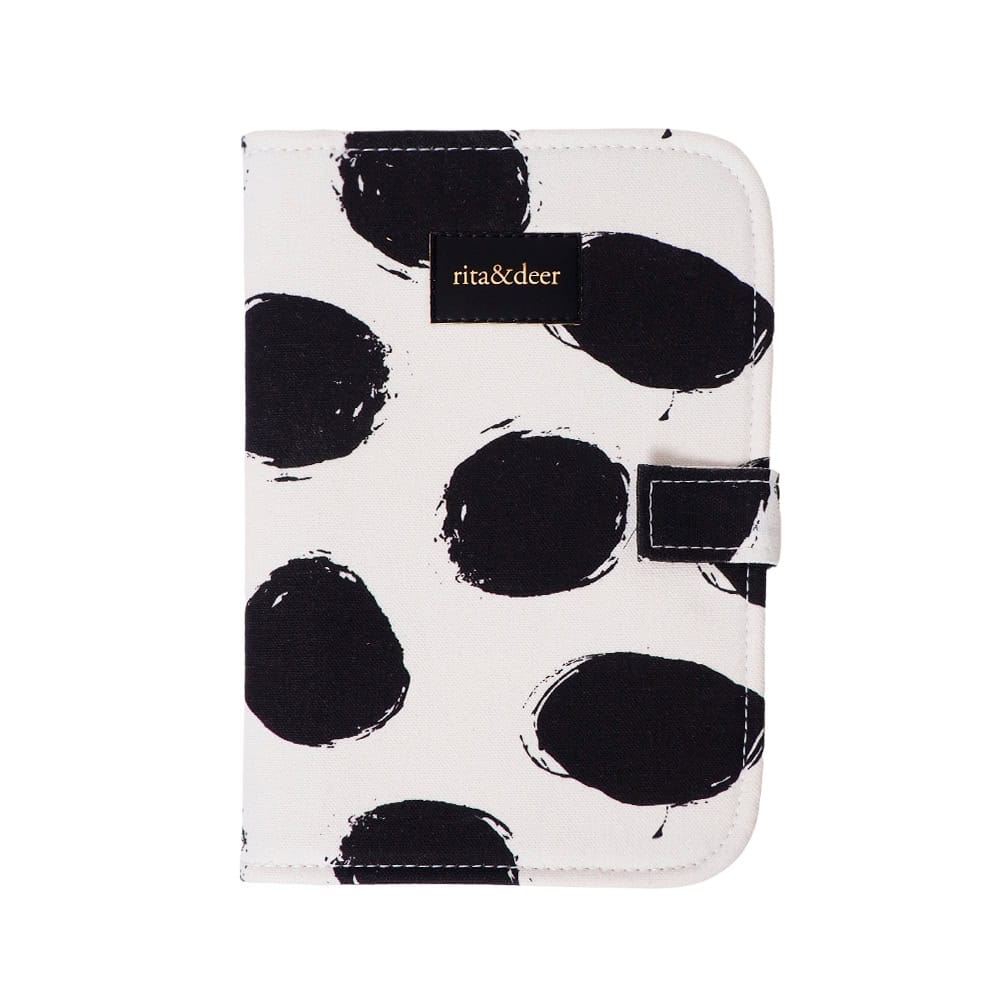 potadocumentos de bebe con estampado dots con lunares o motas de color negro