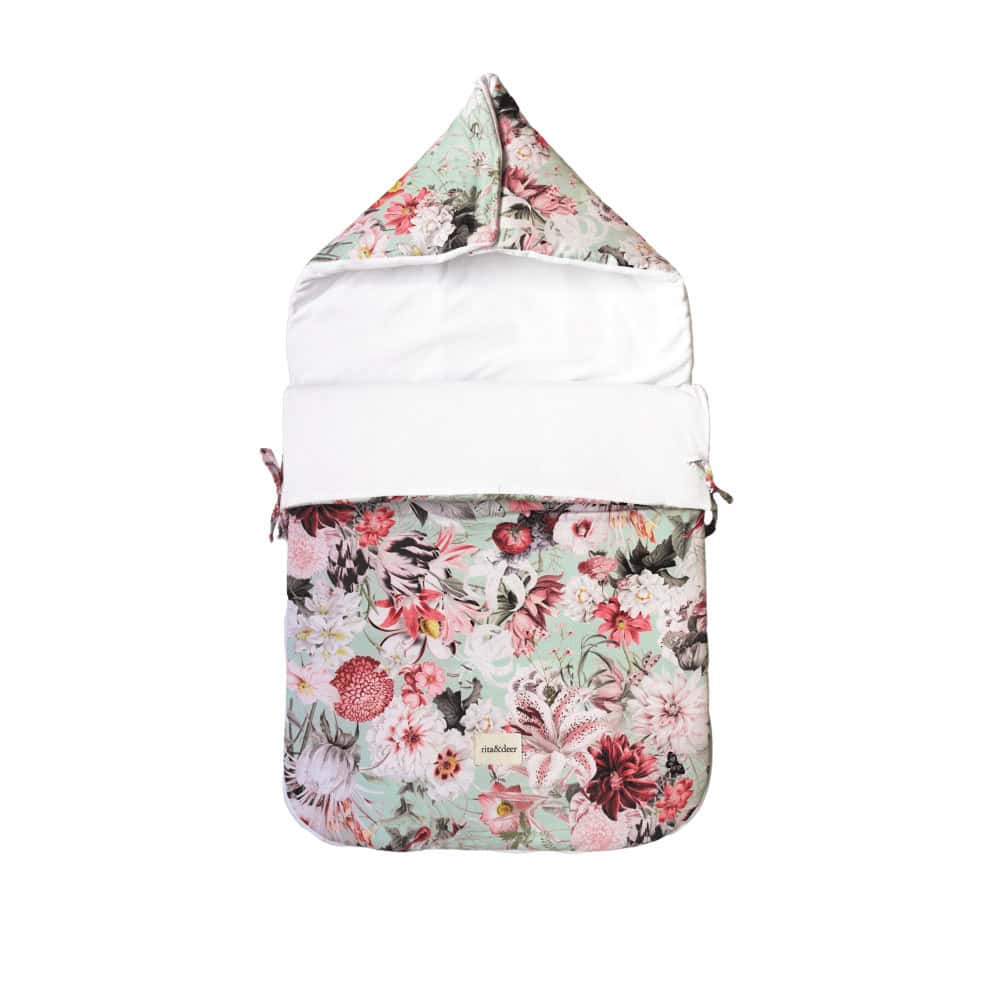 saco capazo para bebé universal para todos los carritos del mercado. En fondo verde mint estampado en flores grandes.
