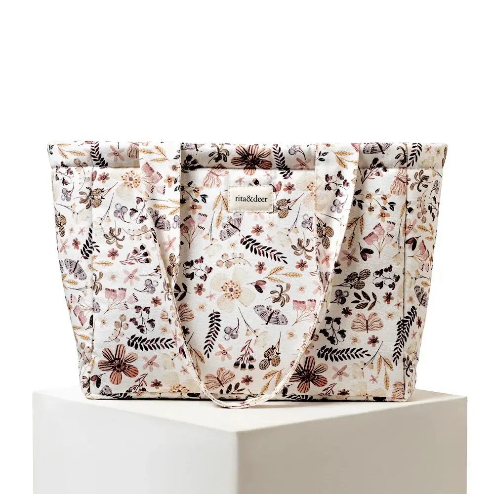 Baby stroller bag or panera stroller bag with a butterfly print and a stain-resistant, waterproof finish.