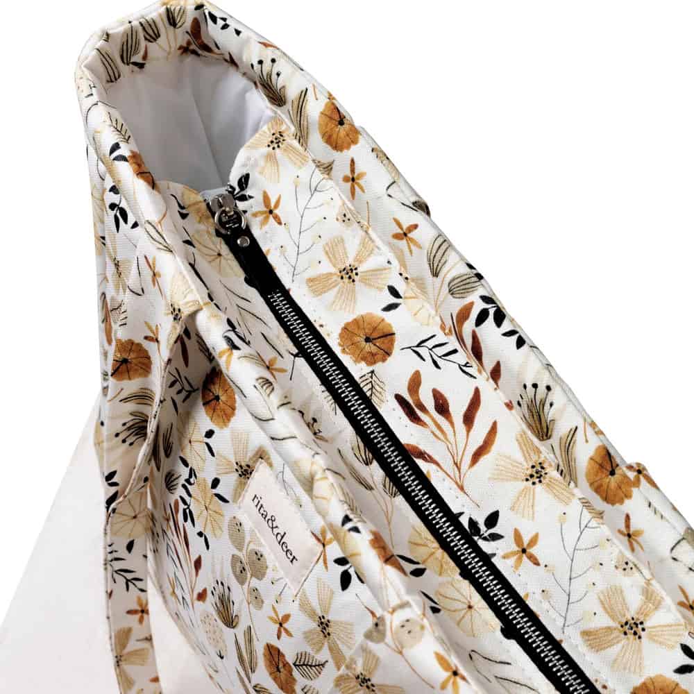 bolso de carro bebé panera bloom detalle de cremallera ykk
