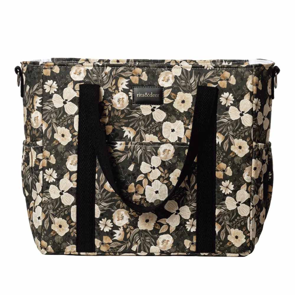 bolso de carro de bebé green forest con fondo verde y estampado de flores