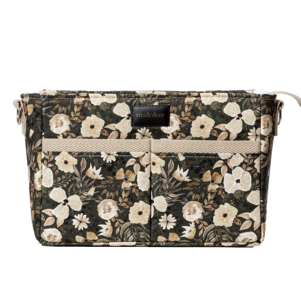 bolso organizador carro bebé de color verde y flores estampadas green forest
