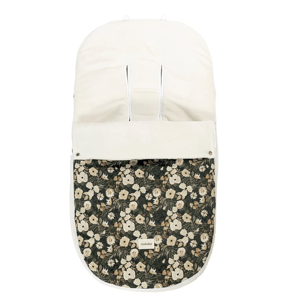 saco carro de bebé de invierno green forest con fondo en verde y flores en beige con interior beige