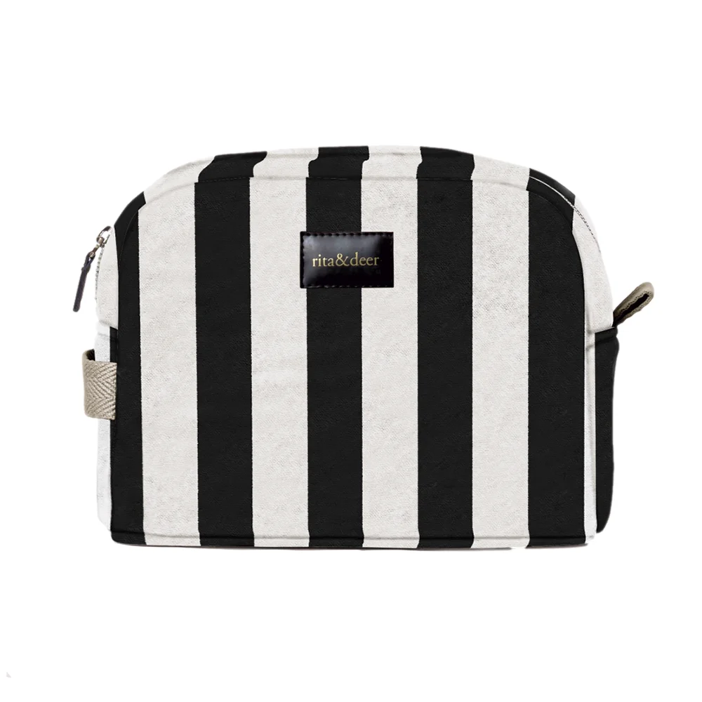 neceser de bebé recién nacido con estampado de rayas negras y fondo en color beige con cinta de espiga en empuñadura de color beige
