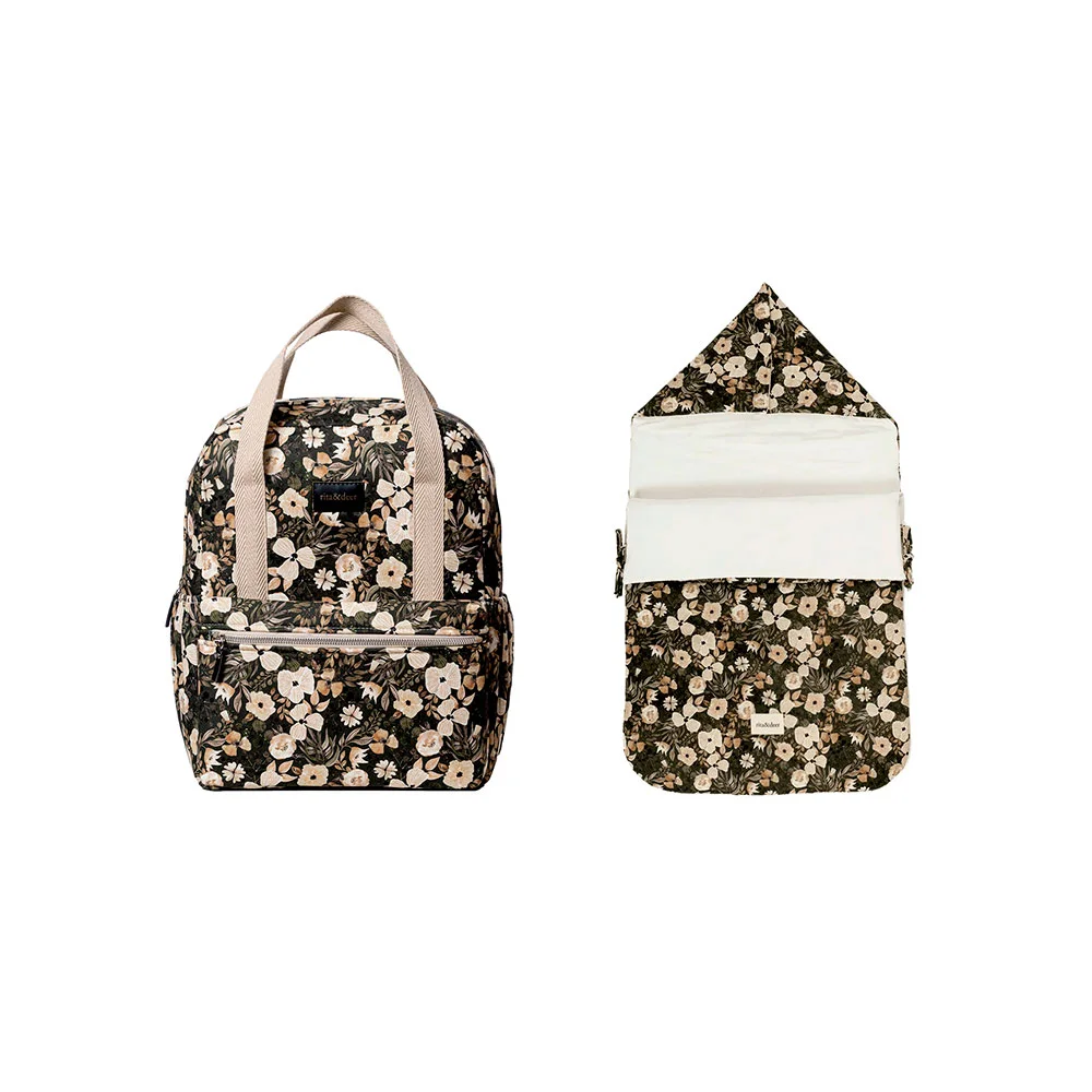 El pack mochila para carrito de bebé Green Forest de color verde con saco capazo de Rita & Deer combina diseño y funcionalidad con características clave como el tejido antimanchas e impermeable. Este conjunto es ideal para padres que buscan soluciones prácticas y elegantes para el paseo del bebé. Este conjunto esencial combina una práctica mochila para tu carrito y un acogedor saco capazo, ambos confeccionados con tejido de algodón 100% orgánico OEKO-TEX que es a la vez lleva un acabado antimanchas e impermeable.