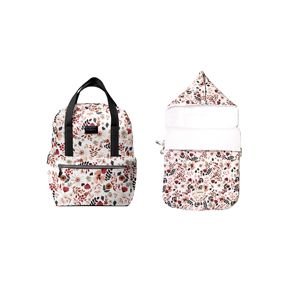 El pack mochila para carrito de bebé Spring Passion con saco capazo de Rita & Deer combina diseño y funcionalidad con características clave como el tejido antimanchas e impermeable. Este conjunto es ideal para padres que buscan soluciones prácticas y elegantes para el paseo del bebé. Este conjunto esencial combina una práctica mochila para tu carrito y un acogedor saco capazo, ambos confeccionados con tejido de algodón 100% orgánico OEKO-TEX que es a la vez lleva un acabado antimanchas e impermeable.